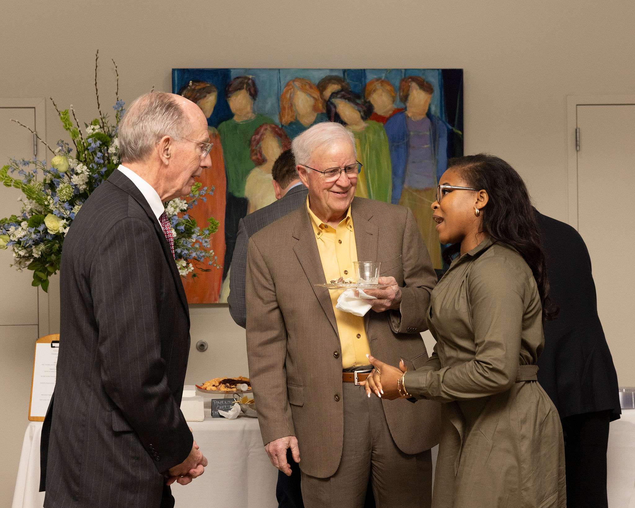 people chat at event